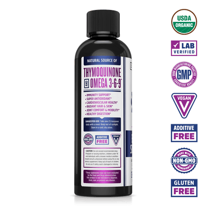 Organic, Cold-Pressed Black Seed Oil From Zhou Nutrition. Bottle side. USDA organic, lab verified, good manufacturing practices, vegan, additive free, made with non-GMO ingredients, gluten free.